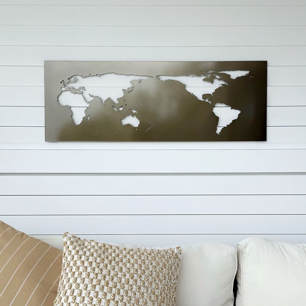 Laser cut world map wall art in glossy pewter bronze finish, NZ-made steel decor