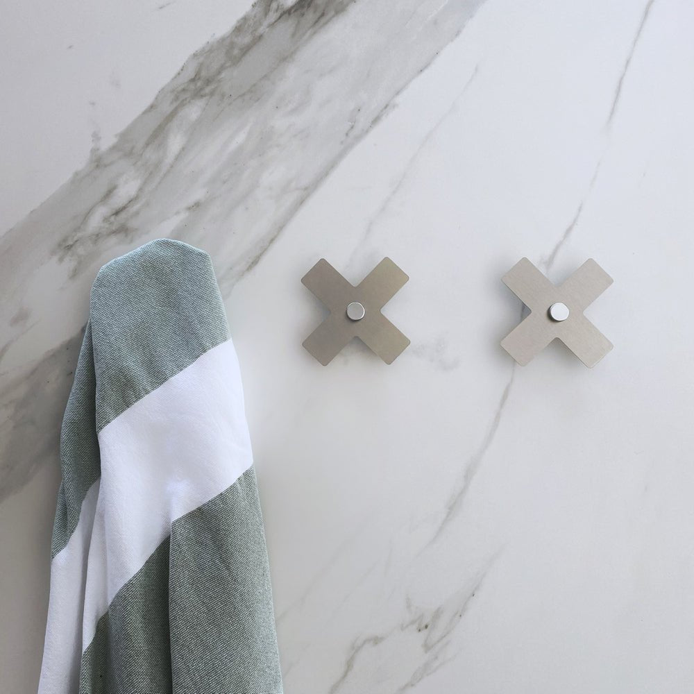Marine grade brushed stainless steel cross wall hooks for outdoors. 
