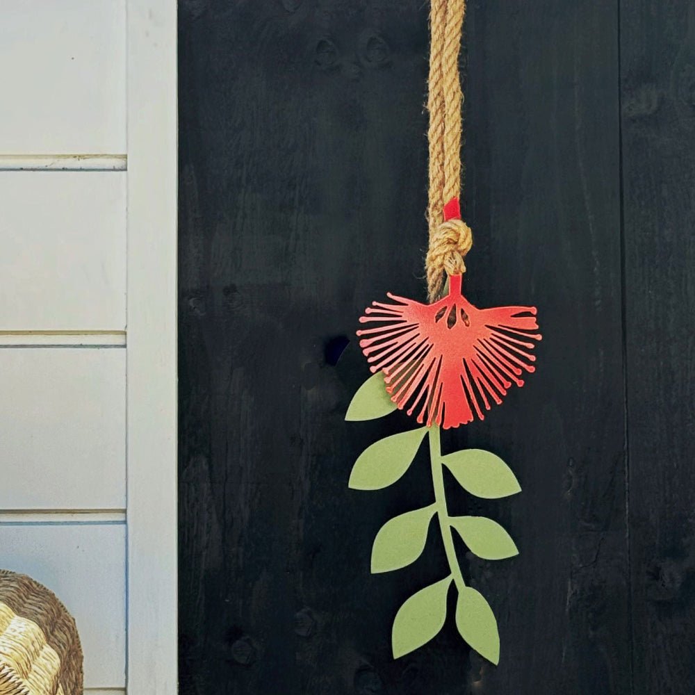 This large pohutukawa metal wall art is laser-cut from steel and made in New Zealand, designed for both indoor and outdoor walls.