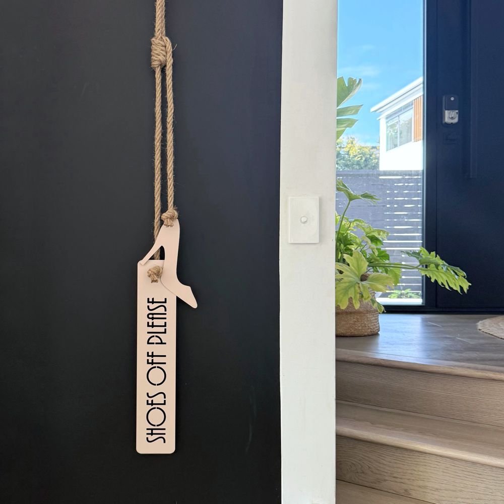 Remove shoes pink sign in NZ home