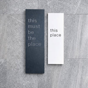 Close up detail of precision cut “This Must Be The Place” typography in 3mm aluminium with rounded corners