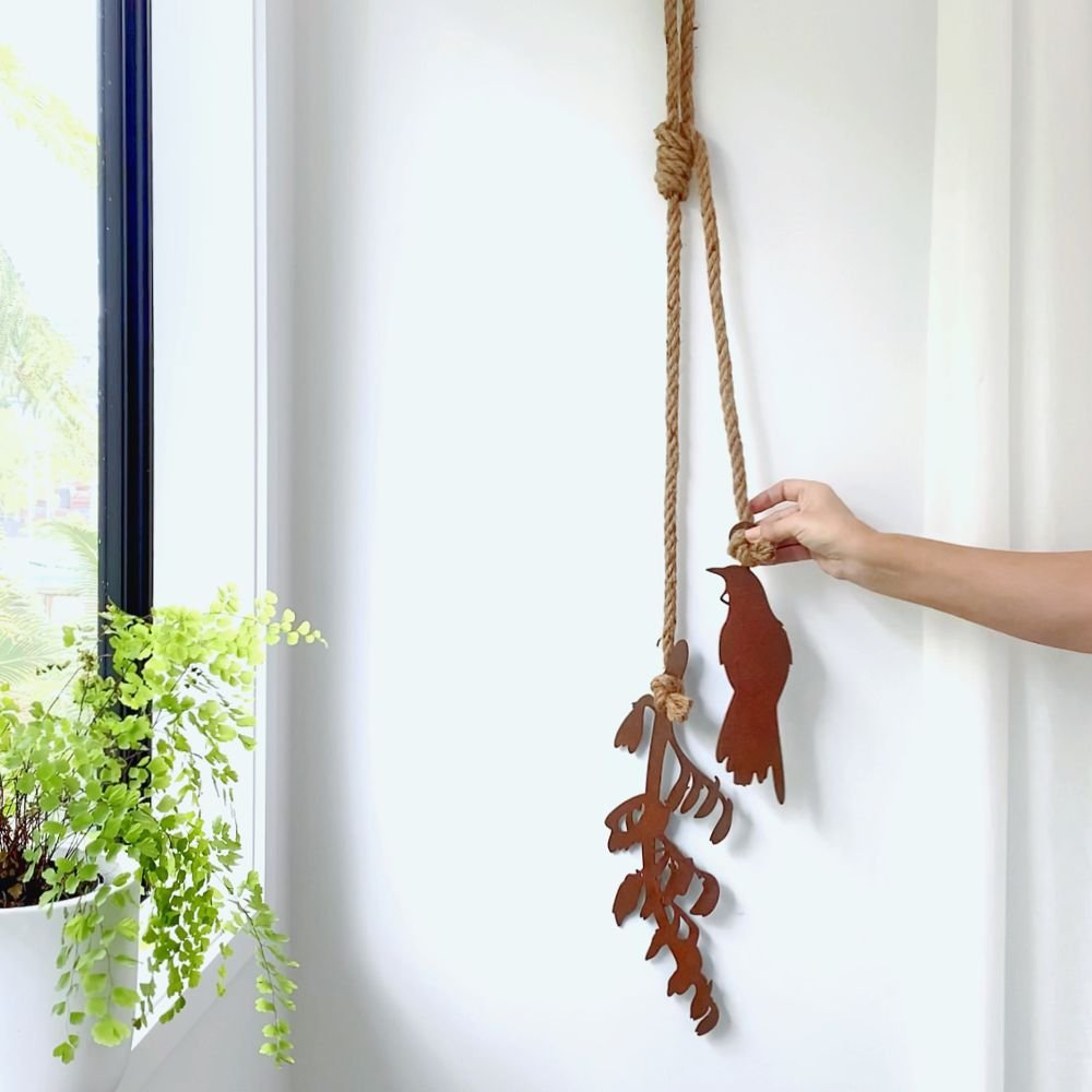 New Zealand corten steel wall art featuring a tūī bird with flax — outdoor garden hanging decor
