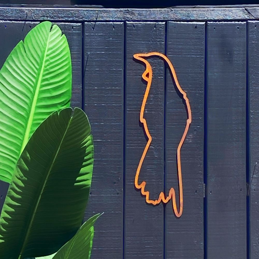 Minimal wall art for outdoor walls - the New Zealand Tui on fence by LisaSarah Steel Designs