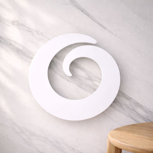 Large 45cm white aluminium round wall art inspired by an unfurling fern frond, minimalist NZ design