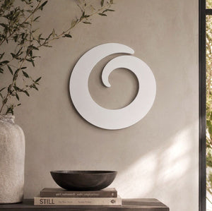 Minimal white metal wall art on wall in modern Auckland home