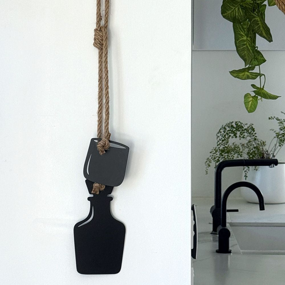 Whiskey bottle and glass wall hanging in matt black steel on jute rope, NZ made by LisaSarah