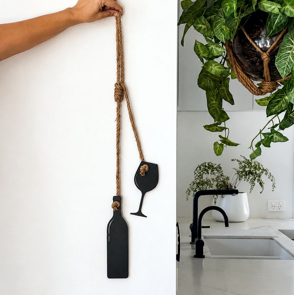 Wine bottle and glass wall hanging in matt black steel on jute rope, NZ made gift by LisaSarah