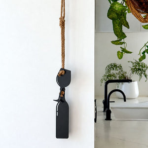 Wine bottle and glass wall hanging in matt black steel on jute rope, NZ made gift by LisaSarah