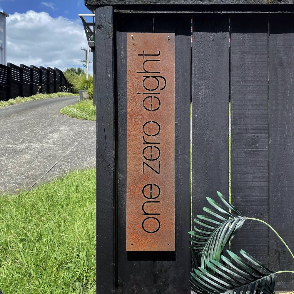 Large corten steel outdoor metal house number sign in words NZ.