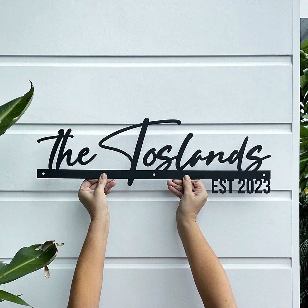 Floating cursive font business name sign NZ