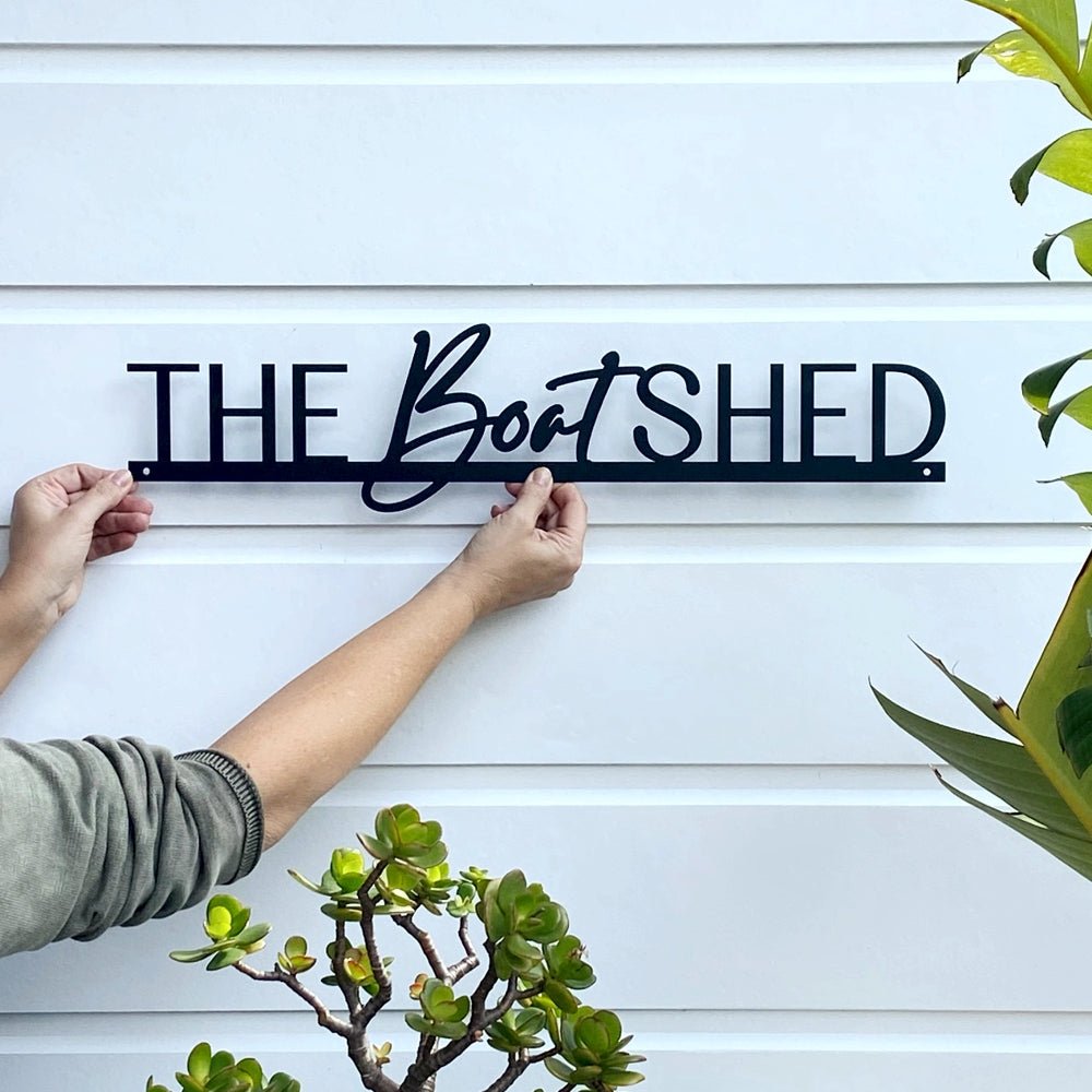 Floating cursive font business name sign NZ