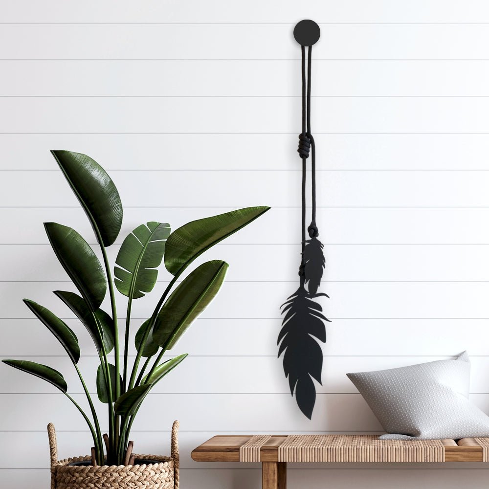 Hanging feathers REG (black) with black rope. Outdoor wall decor ideas. LisaSarah Steel Designs NZ