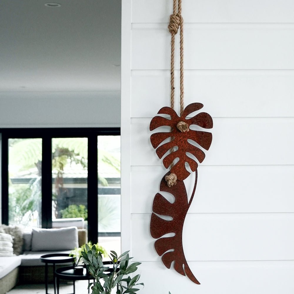 Corten steel NZ made wall decor for outdoor walls.  Monstera leaves artwork. 