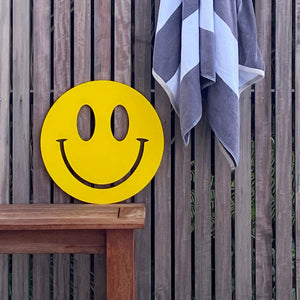 Large yellow smiley face art for outdoors by NZ designer LisaSarah Steel Designs. 