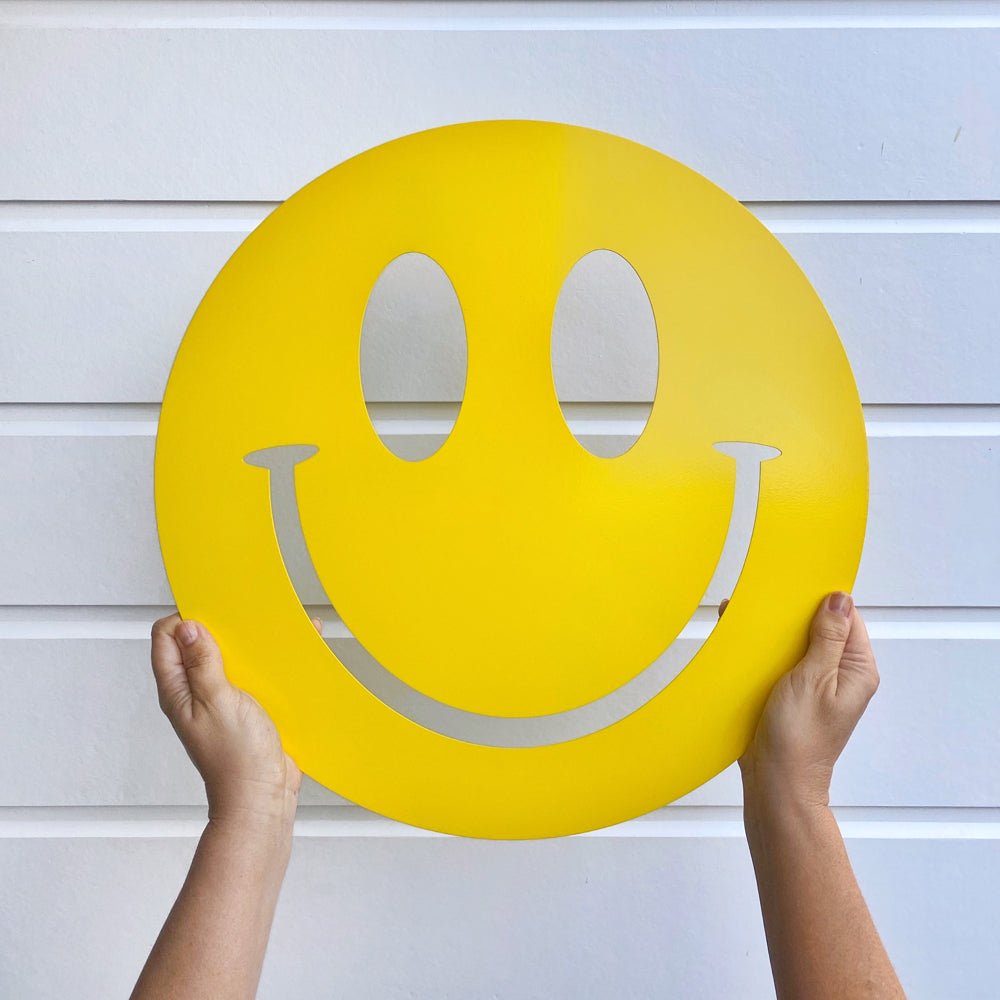 Large yellow smiley face art for outdoors by NZ designer LisaSarah Steel Designs. 