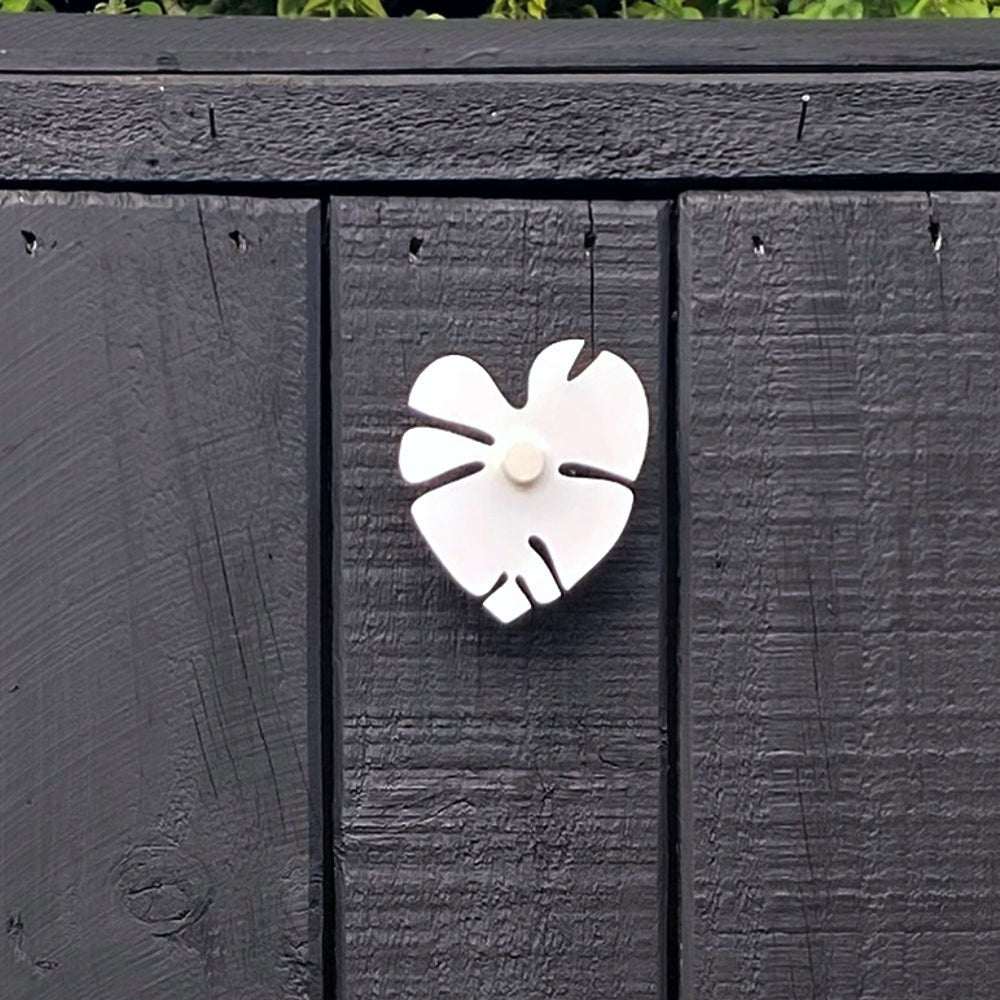 Tropical monstera white steel wall hooks for outdoor walls.  NZ made by LisaSarah Steel Designs