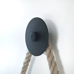 Decorative wall hook for outdoors, close up. 